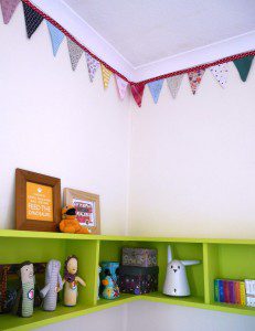 Toddler shelves and bunting - colourful and eclectic toddler room tour
