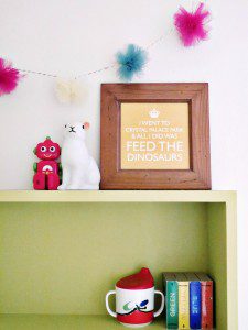 Pom pom garland and children's colourful bookshelf