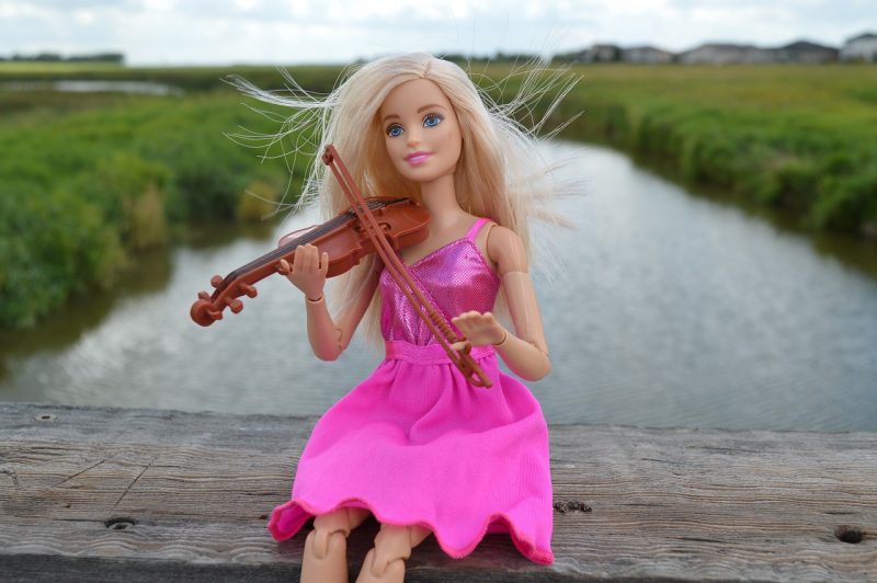 Barbie playing the world's smallest violin
