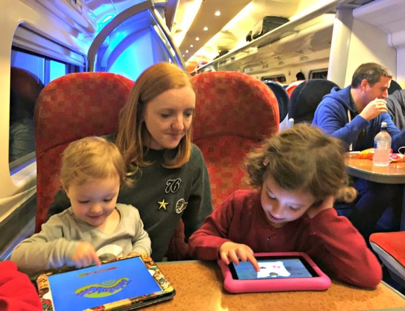 Tips for stress-free travel by train with small children - take iPads