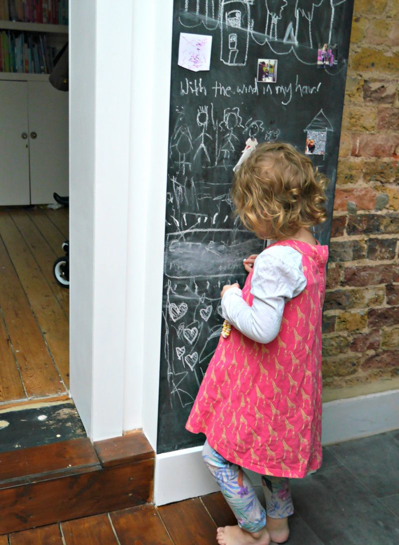 Magnetic chalkboard walls in kitchens, with exposed brick