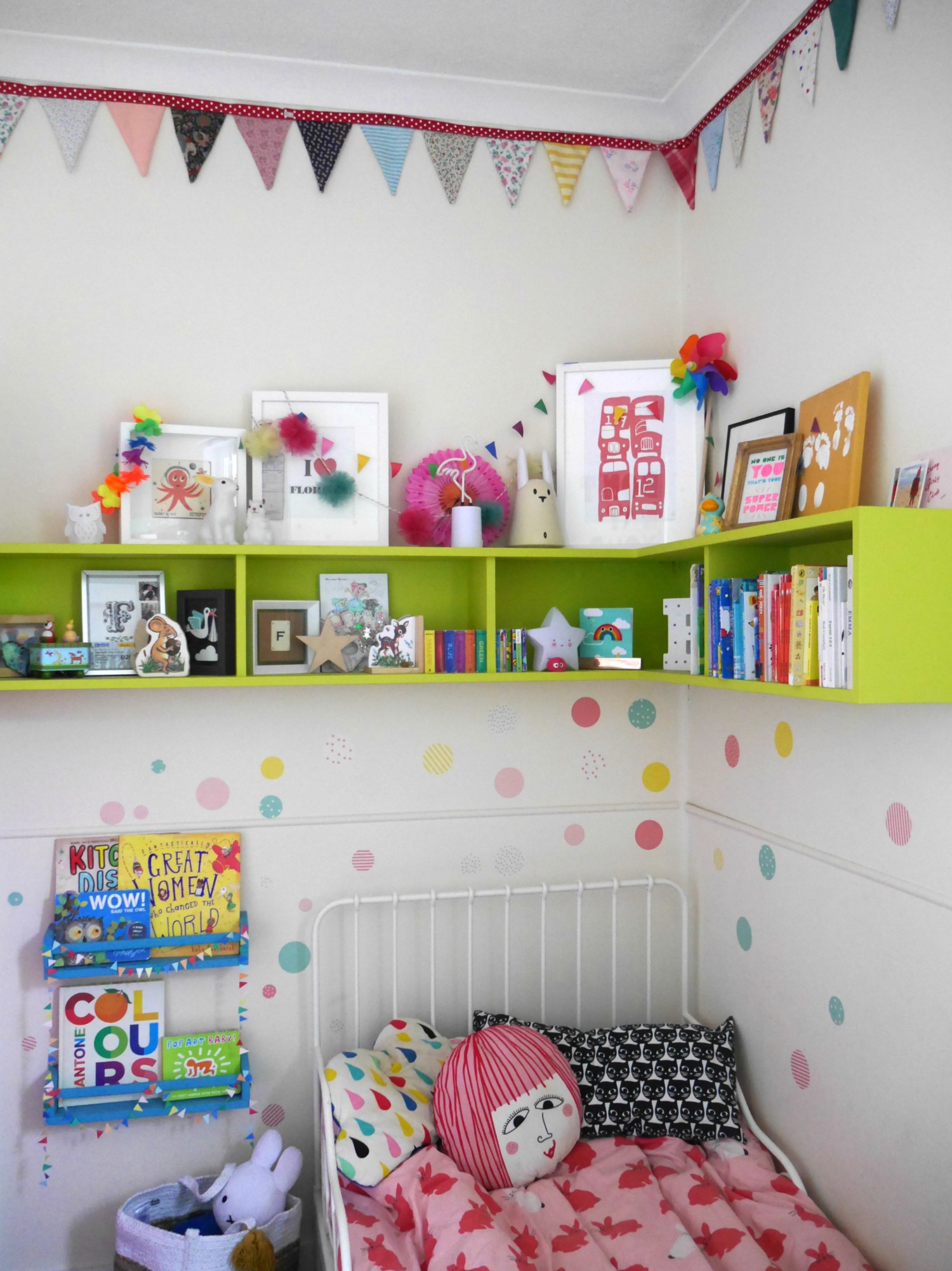Colourful children's bedrooms with painted shelves and wall stickers