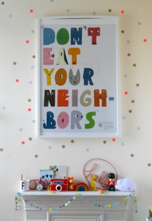 Don't eat youre neighbours poster and DIY wall stickers in a colourful children's bedroom