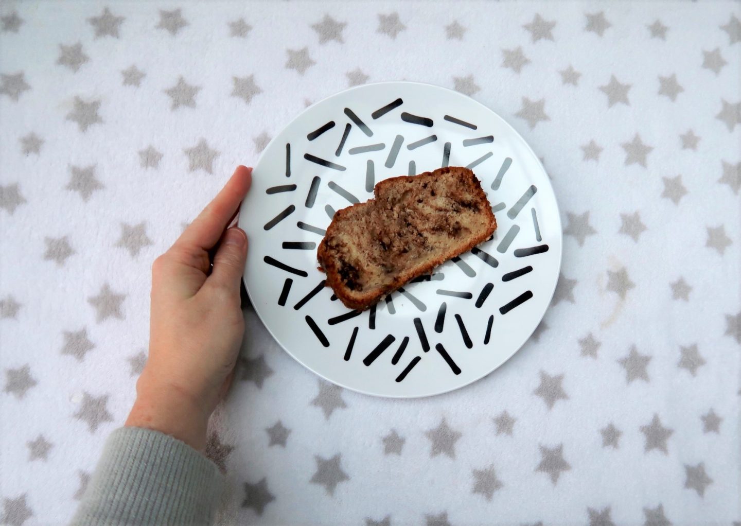 Slice of easy banana cake with chocolate spread